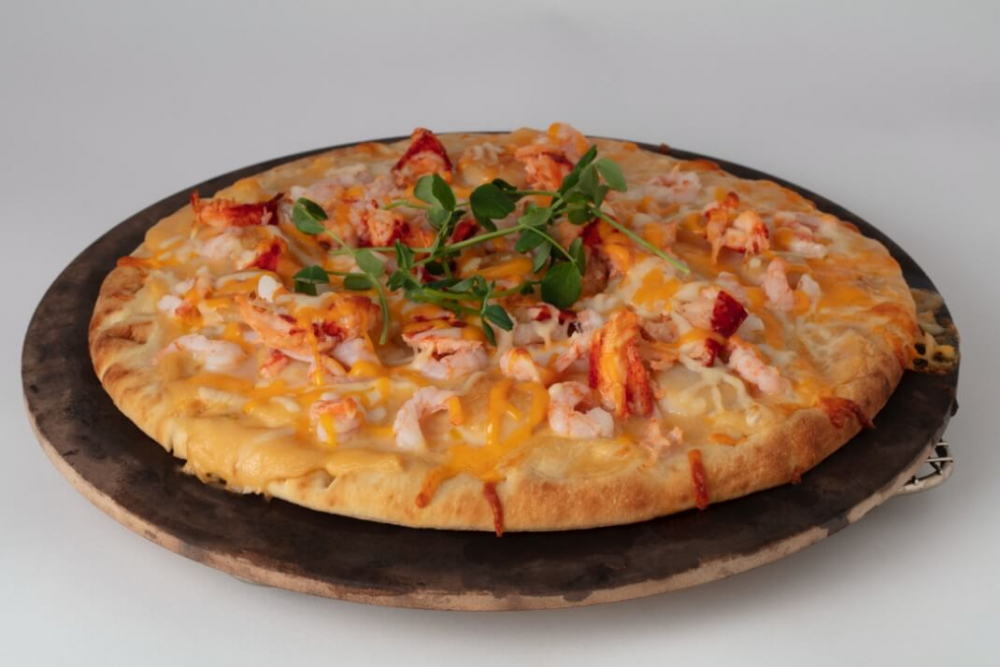 Pizza made with seafood sauce